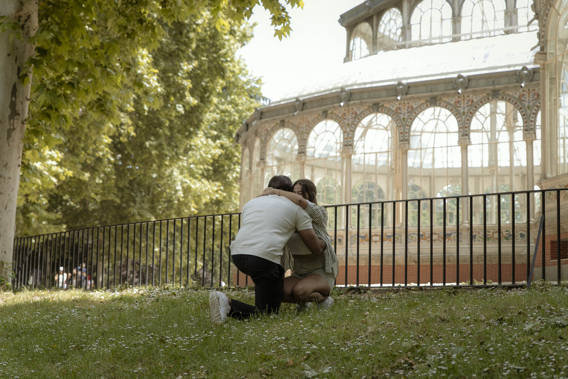 surprise proposal at retiro park in madrid, spain