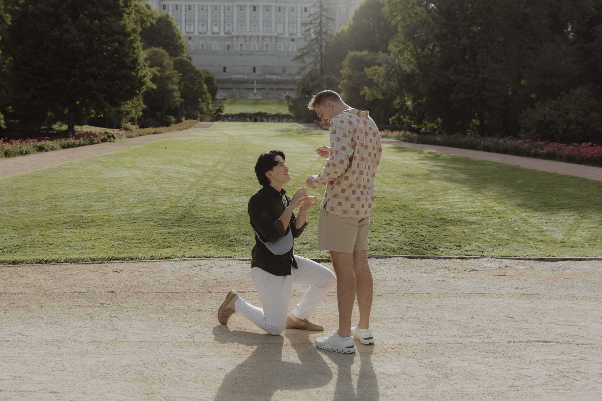 Proposal moment in Campo del Moro Gardens with Palacio Real in the background
