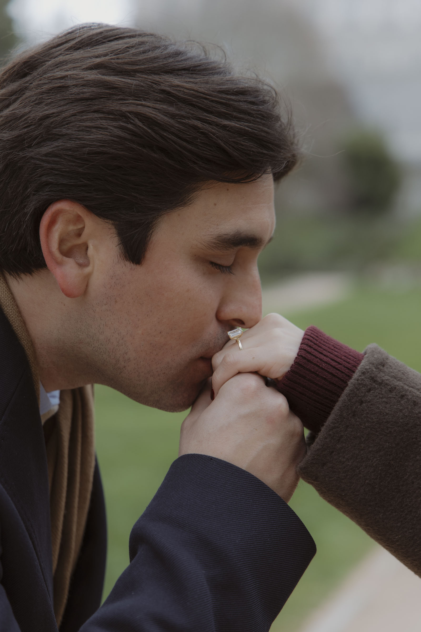Newly engaged couple walking through Campo del Moro Gardens