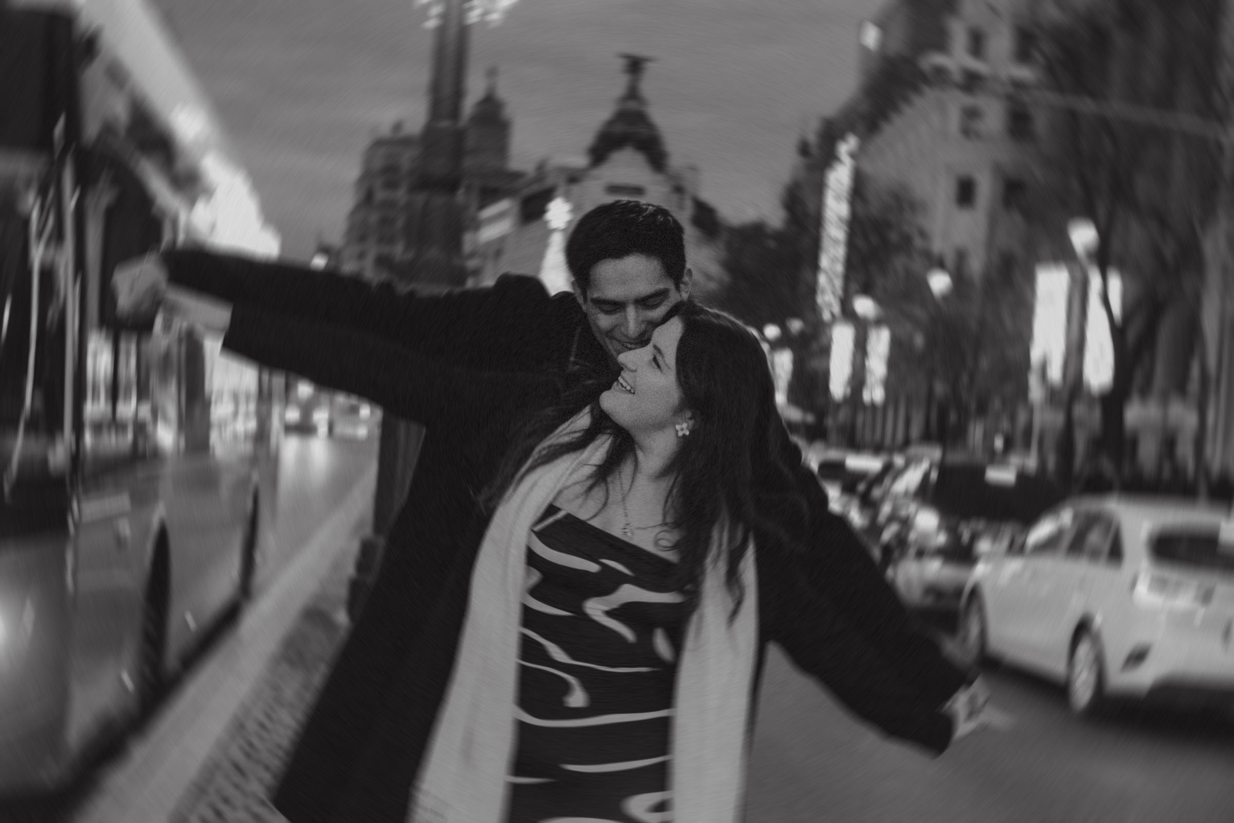 christimas engagement photoshoot at gran via street in madrid at night