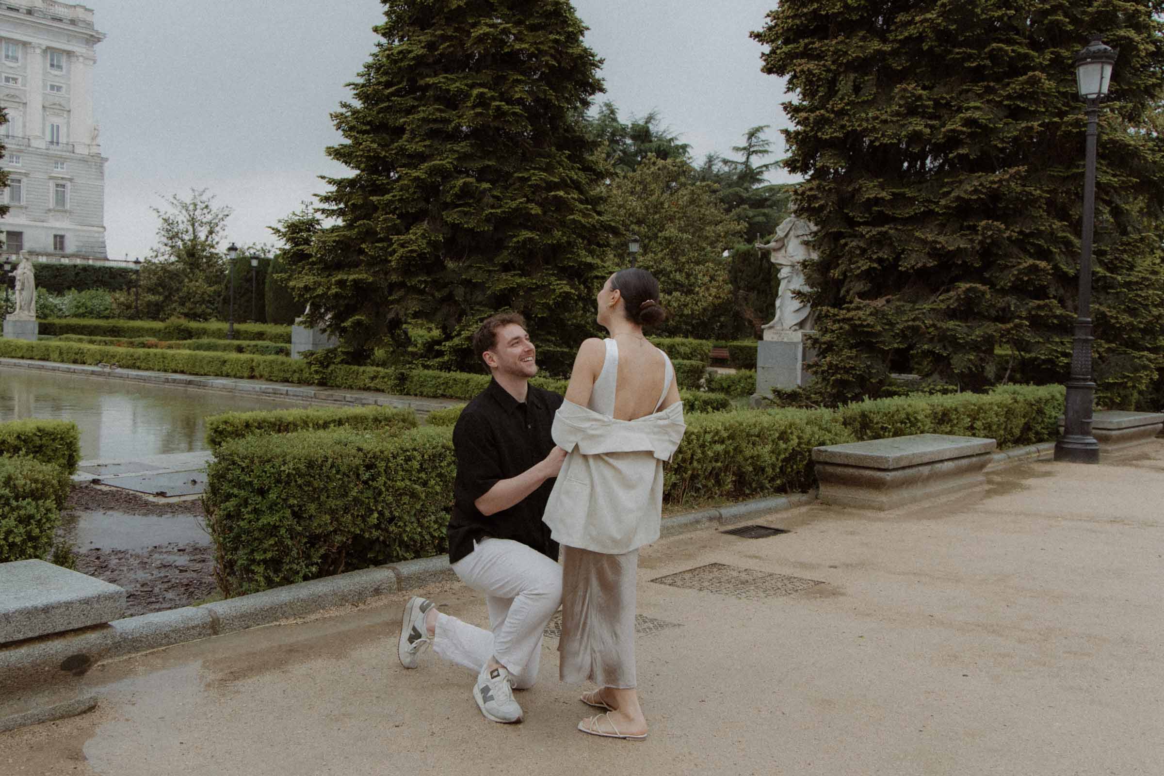 Surprise proposal in Madrid at Sabatini Gardens with emotional reaction