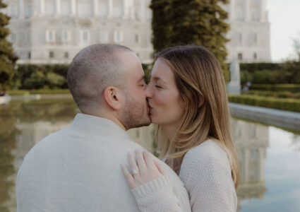 romantic surprise proposal photography with a professional photographer capturing the moment in sabatini gardens with the royal palace in the background